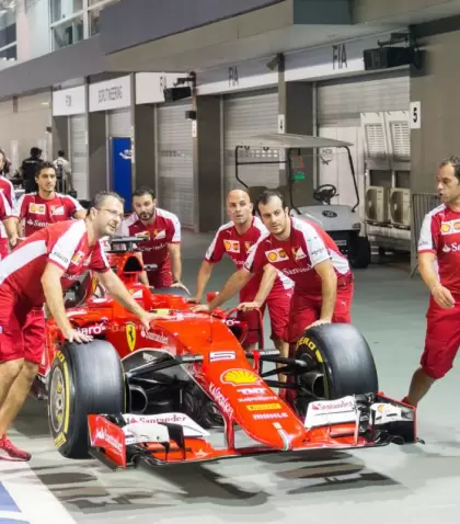 sebastian-vettels-car-being-wheeled-back-to-the-team-garage-during-the-pit-lane-experience-tour-in_t20_NoyzrB