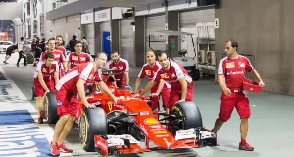 sebastian-vettels-car-being-wheeled-back-to-the-team-garage-during-the-pit-lane-experience-tour-in_t20_NoyzrB